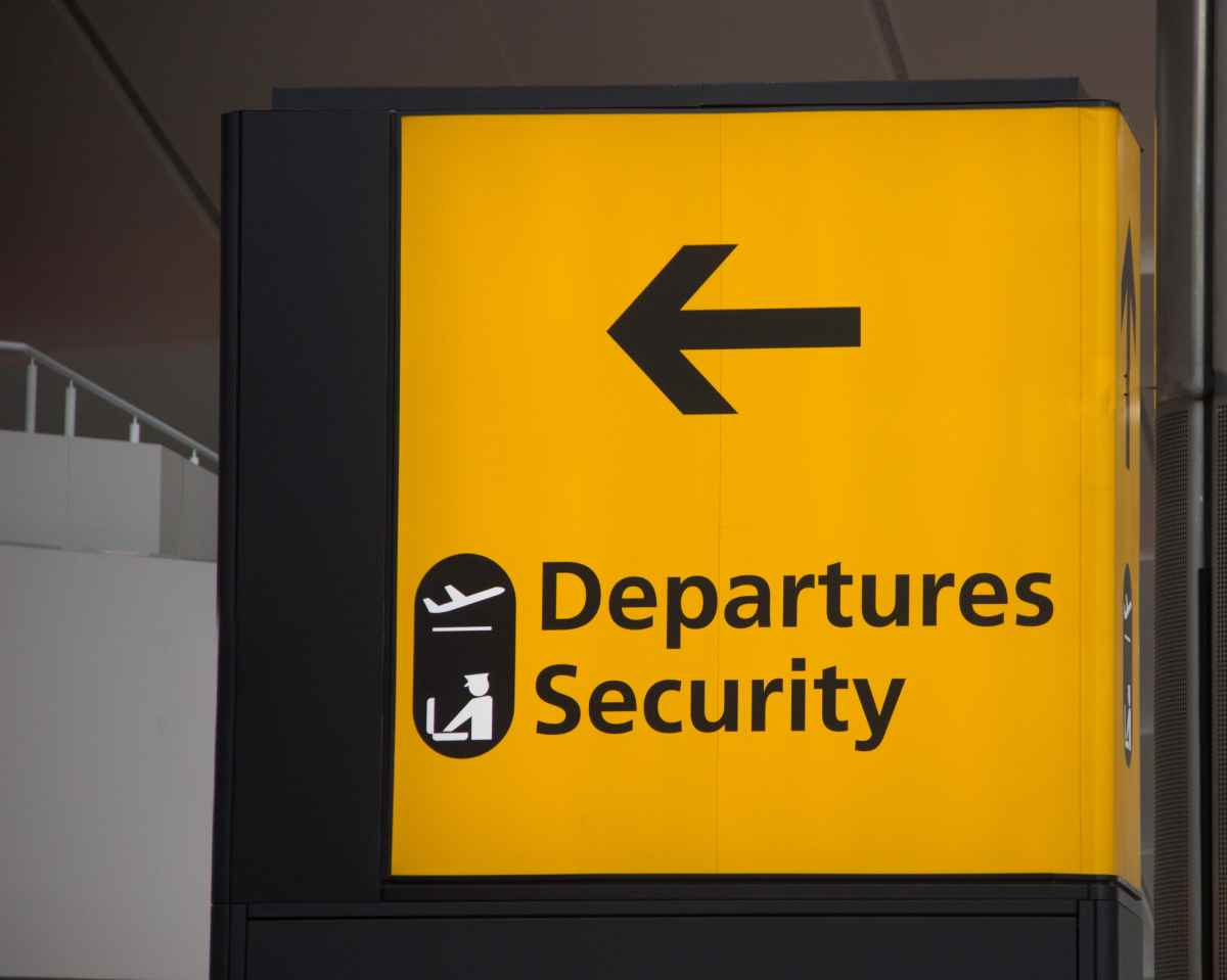 Airport wayfinding hanging sign by Total Sign Works